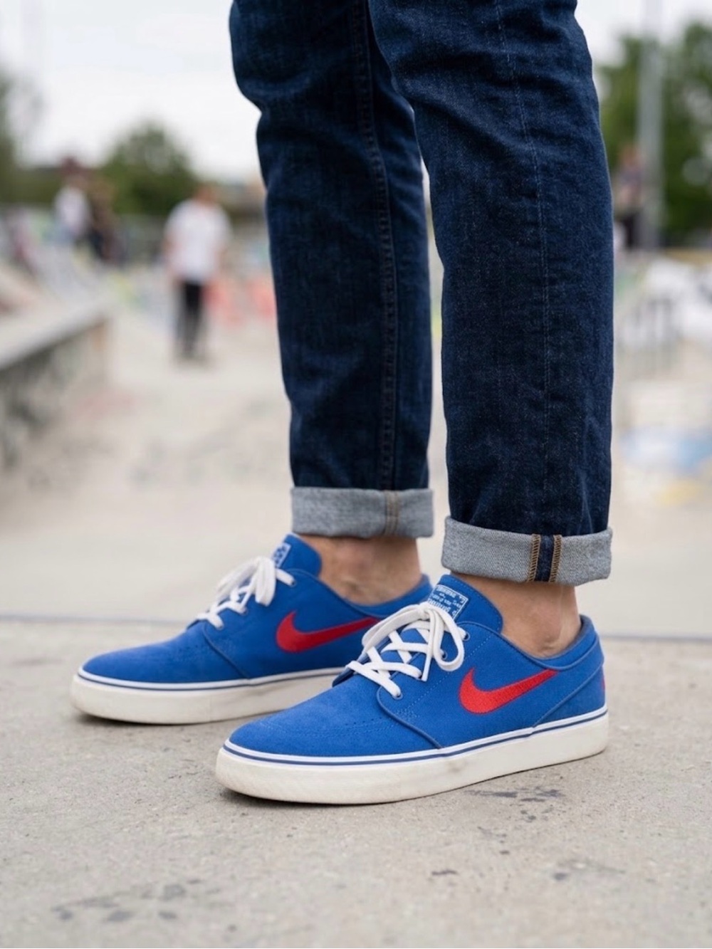 Nike Men's Blue Sneakers with Red Swoosh and White Sole